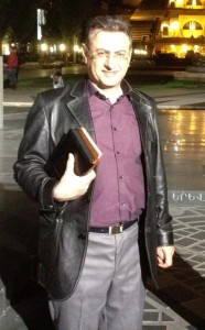 Pastor Robert Asserian, pictured here with Bible, has been released from prison but concerns remain over conditions.