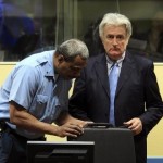 icty Radovan Karadzic (r) during an earlier appearance in front of the U.N. Court in The Hague