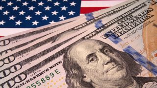 bigstock Us Dollars On Background Of Us 258193594 us economy