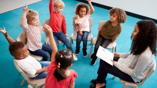 bigstock Young female school teacher re 277905148 school students